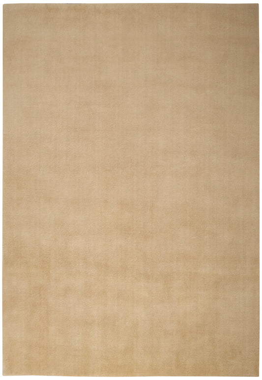 Light tan rectangular rug with subtle texture and soft, matte finish.