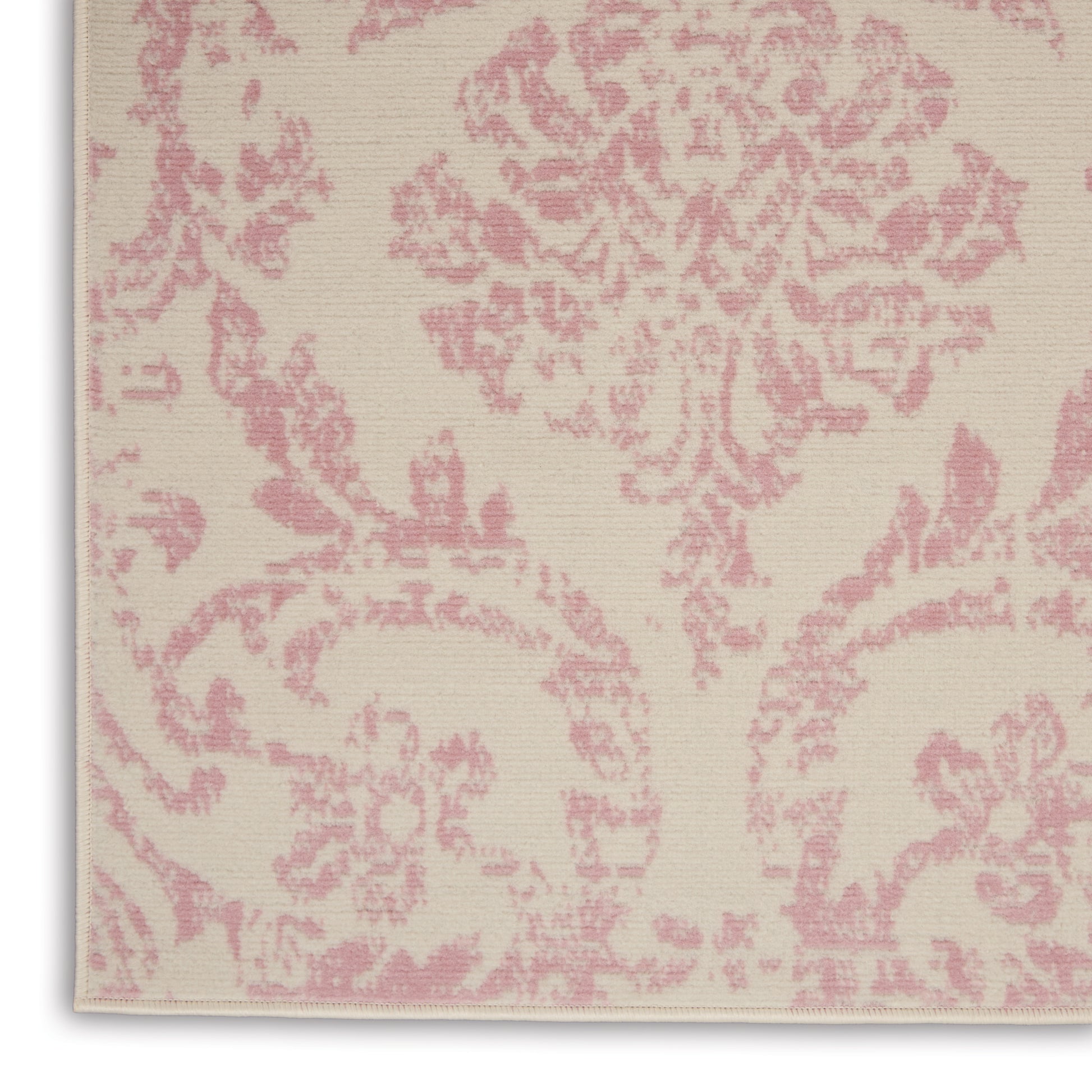 Beige fabric with pink damask floral pattern, decorative textile for upholstery or drapery.