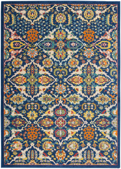 Persian-style rug with navy base & vivid multicolor floral damask pattern in orange, teal, yellow & cream.