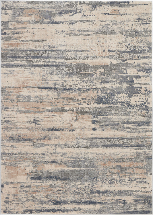 Rectangular abstract distressed rug in beige, gray, blue & peach; modern, soft-textured floor covering.