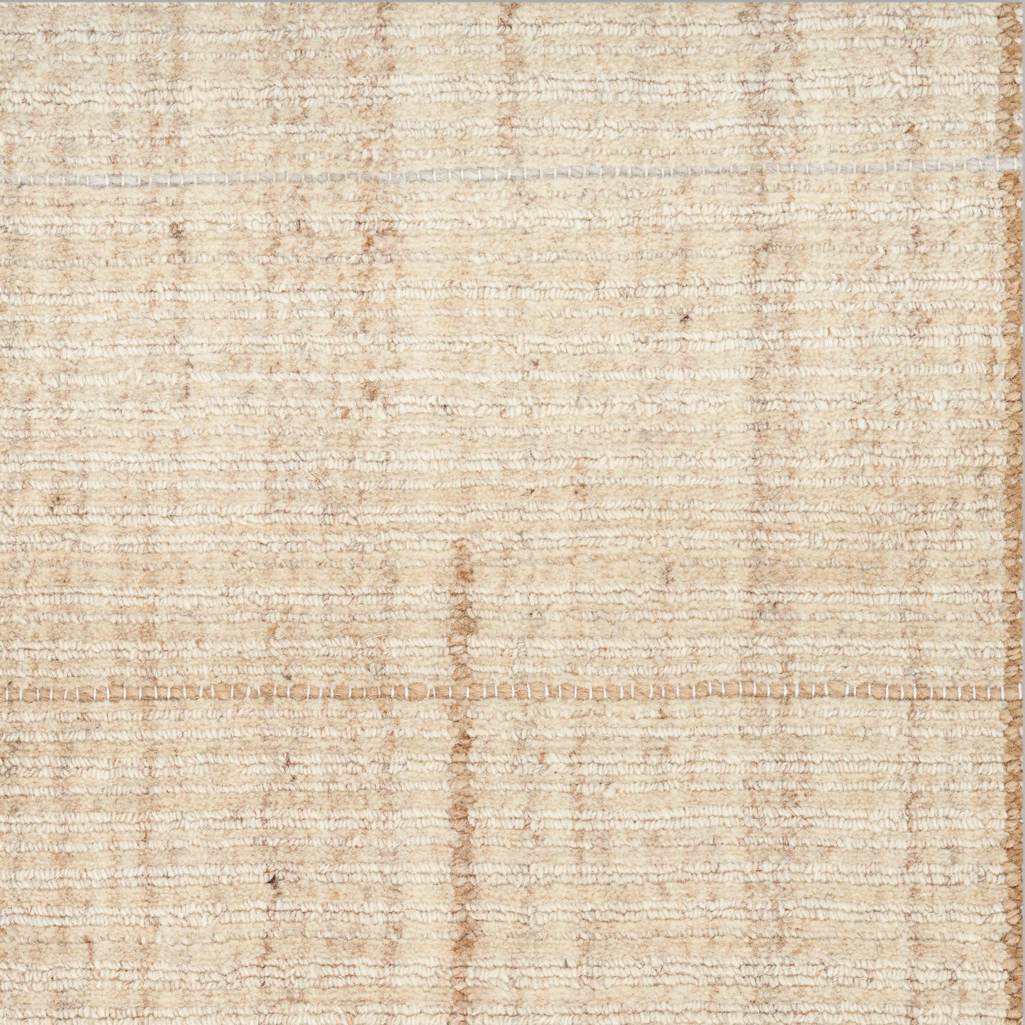 Beige flatwoven rug with soft cream-tan tones and subtle horizontal band texture.