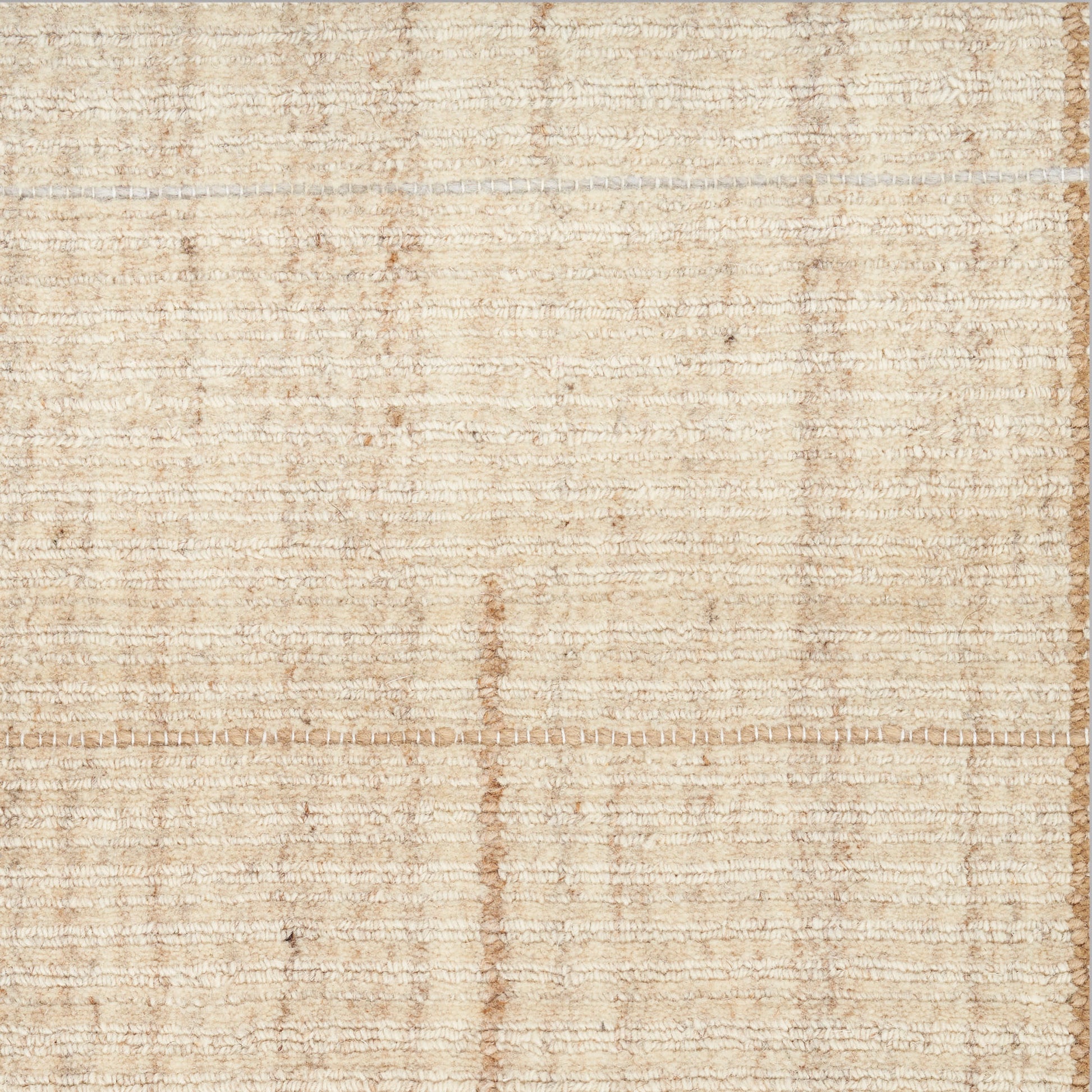 Beige flatwoven rug with soft cream-tan tones and subtle horizontal band texture.