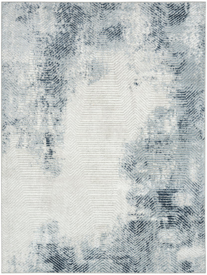 Rectangular blue-gray abstract rug with a whitewashed look and subtle chevron texture for modern living spaces.