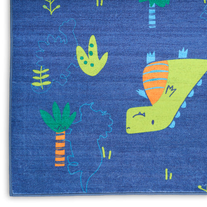 Blue kids' rug with lime dinosaur and palm trees; playful, soft fabric.