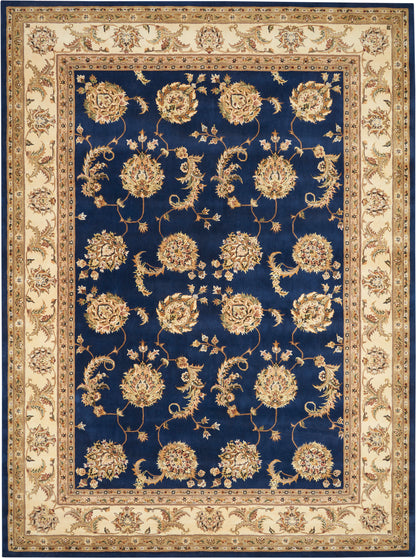 Navy blue rug with cream floral motifs and scrolling vines on a warm beige border; traditional Persian-style area rug.