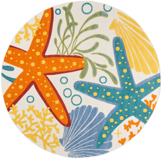 Round coastal placemat with orange and teal starfish, seaweed and shells in bright nautical colors.