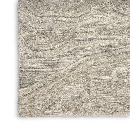 Beige cream textured runner rug with plush looped pile and abstract wavy pattern.