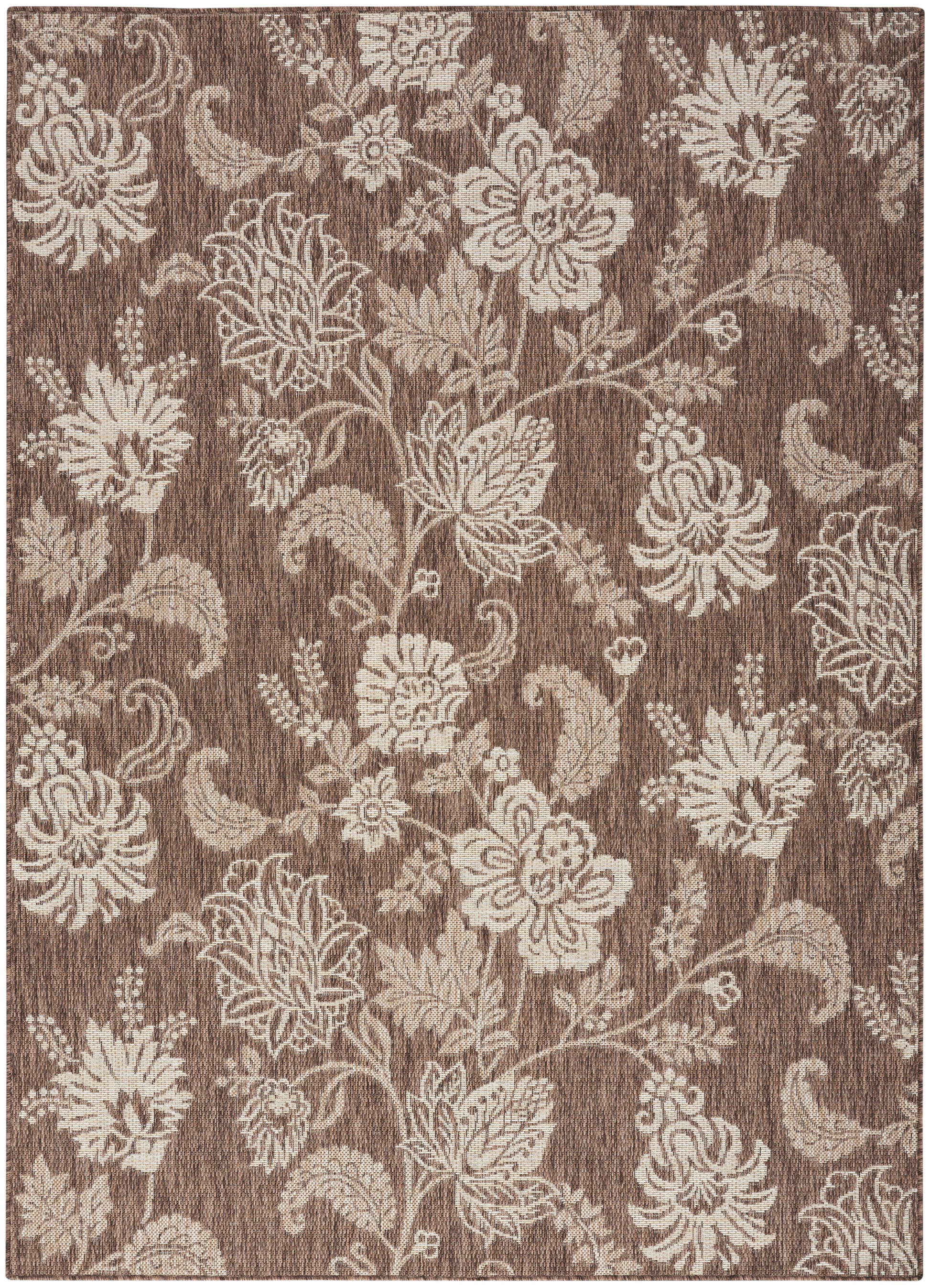 Rectangular brown area rug with cream damask floral pattern; traditional woven textile for living room.