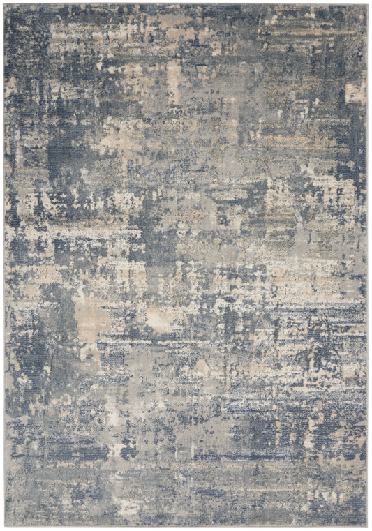 Rectangular abstract blue-gray and ivory distressed area rug with vintage weathered pattern; soft, plush texture.