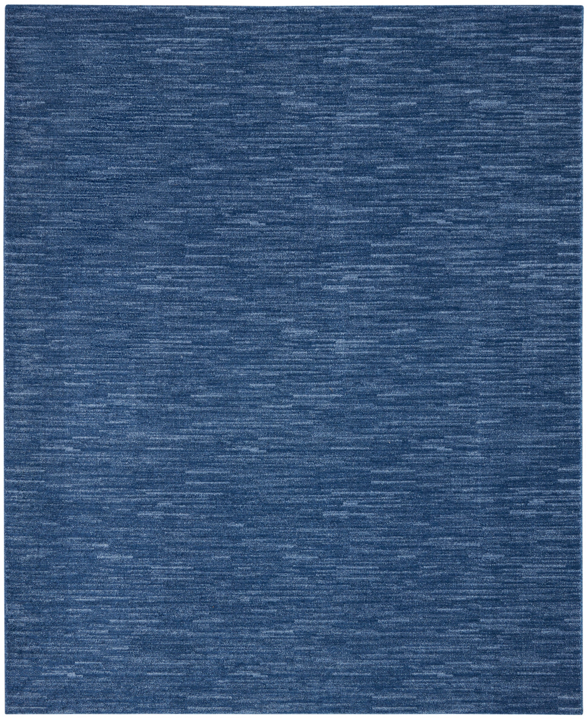 Blue low-pile woven outdoor rug, rectangular with subtle heathered texture and a modern look.