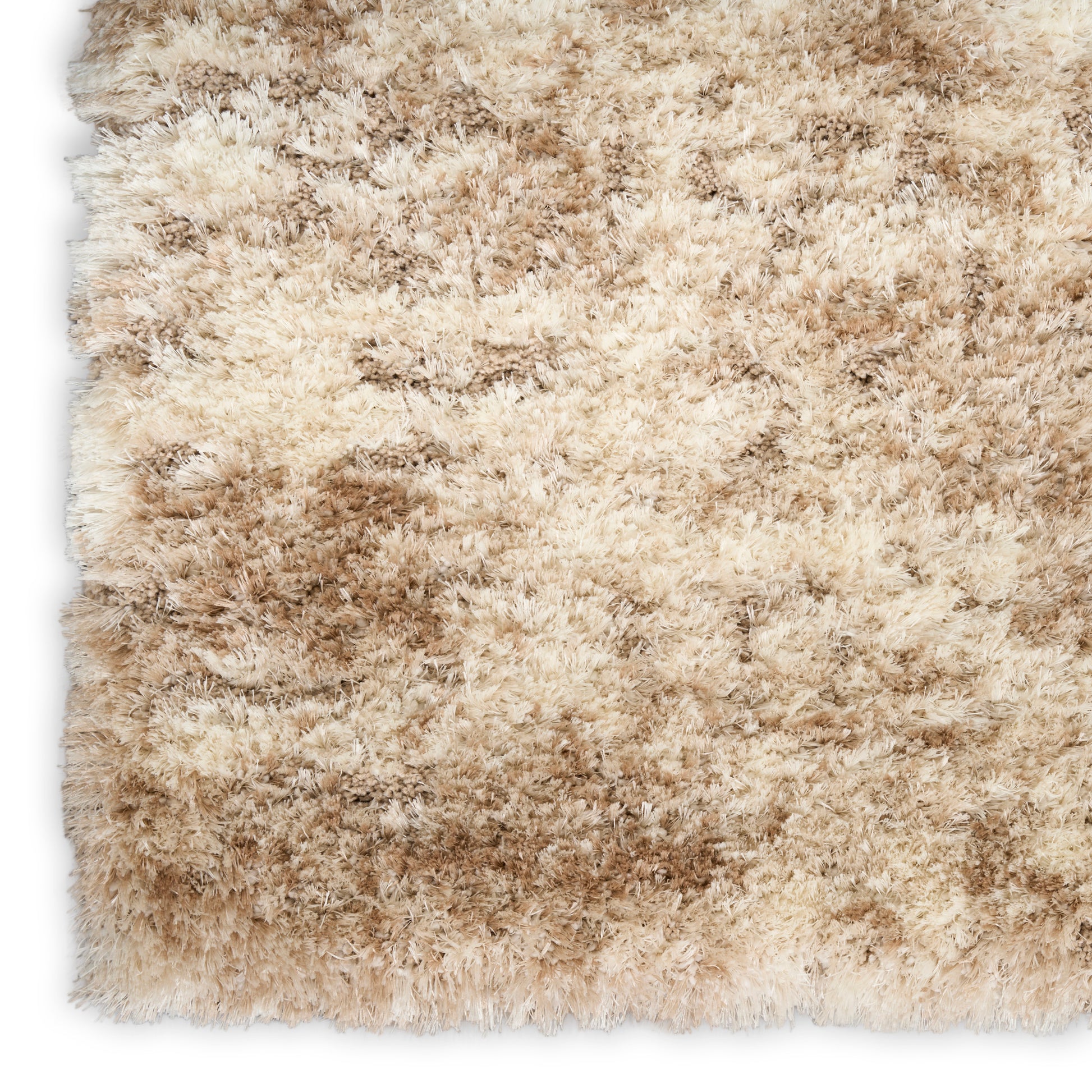Beige & tan shag rug with long plush fibers; soft, fluffy rectangular area rug.