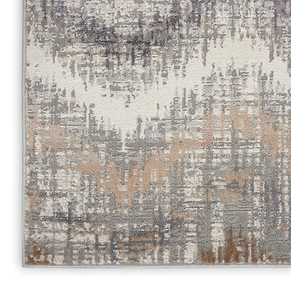 Abstract distressed rug in ivory, gray, taupe & tan tones; modern brushstroke pattern.