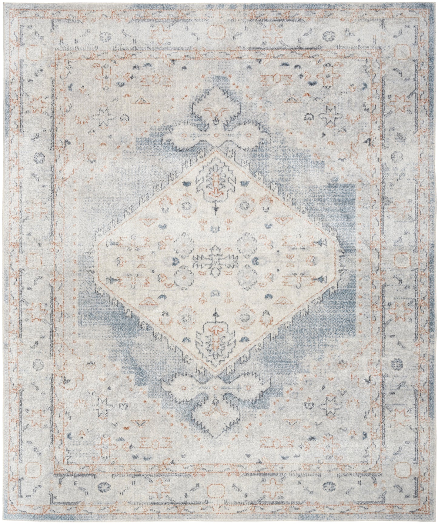 Distressed vintage-style area rug in blue and beige, featuring a central diamond medallion and ornate floral border.