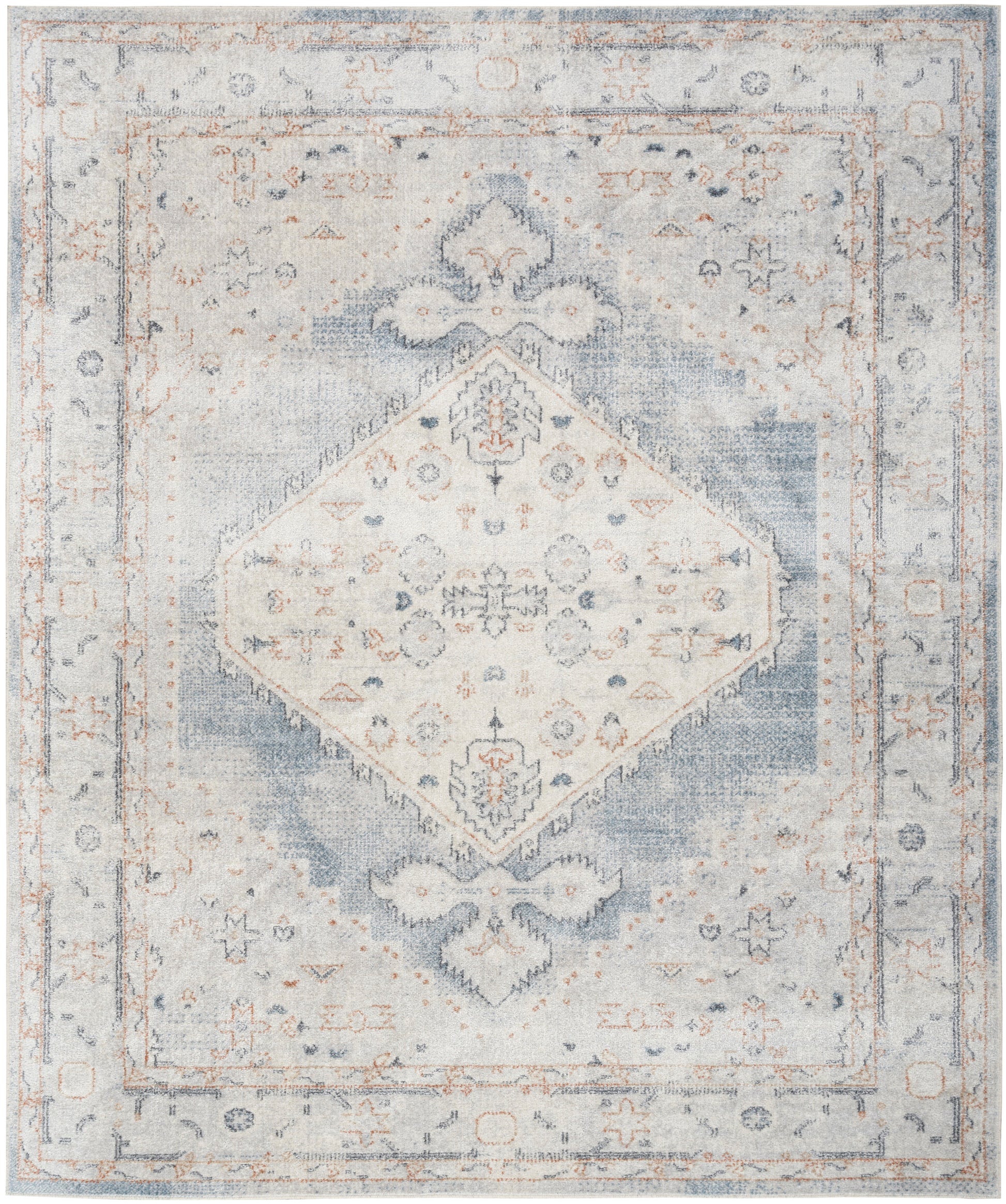 Distressed vintage-style area rug in blue and beige, featuring a central diamond medallion and ornate floral border.