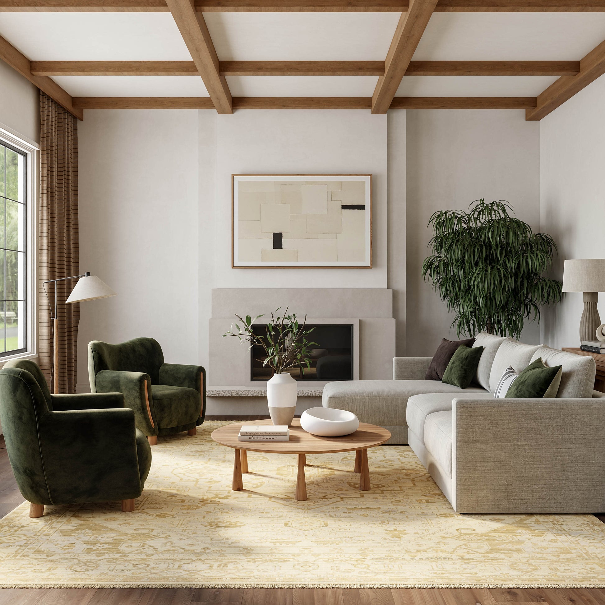 Living room with beige sofa, green velvet chairs, round wood coffee table, plant, abstract art, fireplace, and wood-beam ceiling; vintage 6' x 9' rug.