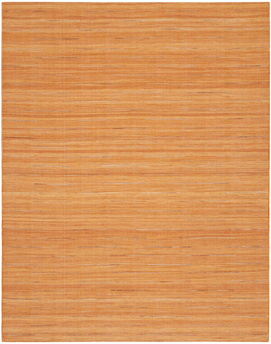 Rectangular orange-brown woven rug in natural fiber with pale horizontal stripes; casual coastal decor.