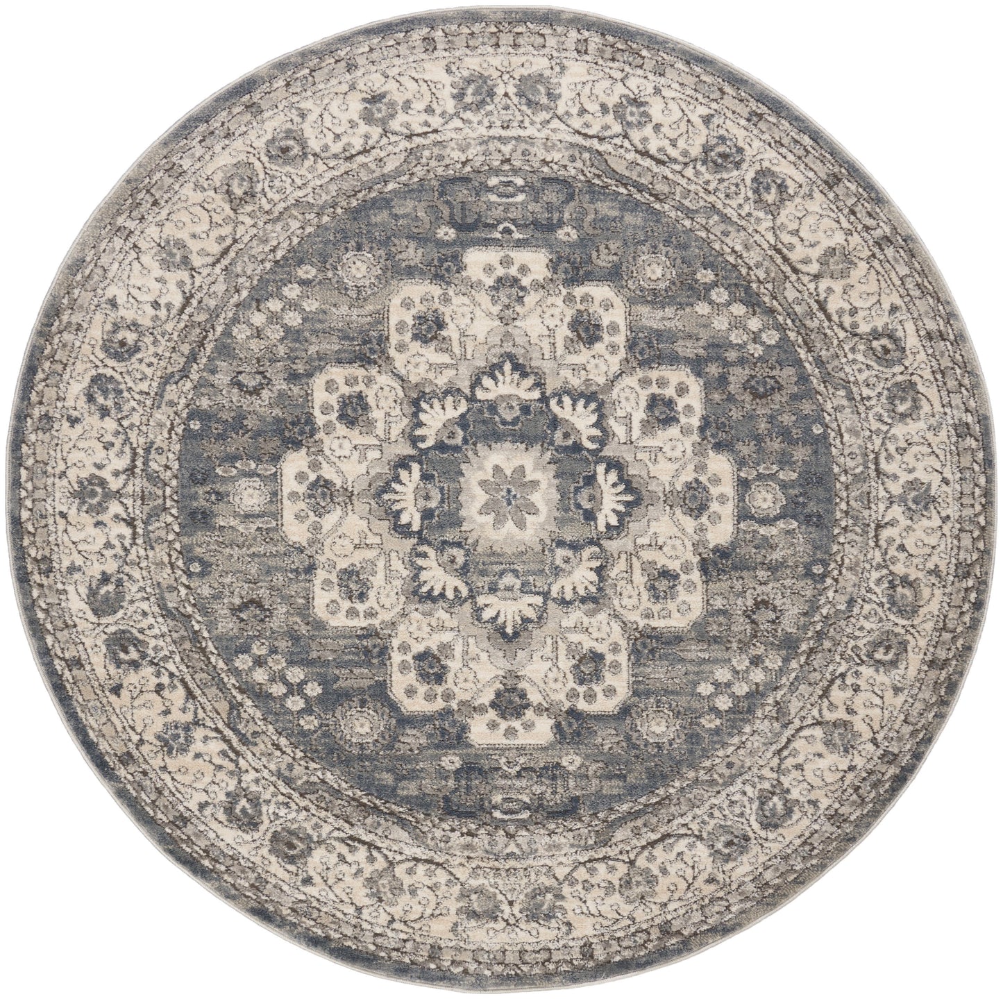 Round blue-gray and ivory Persian-style rug with a distressed medallion and intricate floral border.