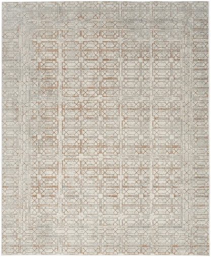 Neutral-toned area rug featuring a repeating geometric lattice pattern in beige, taupe & light gray.