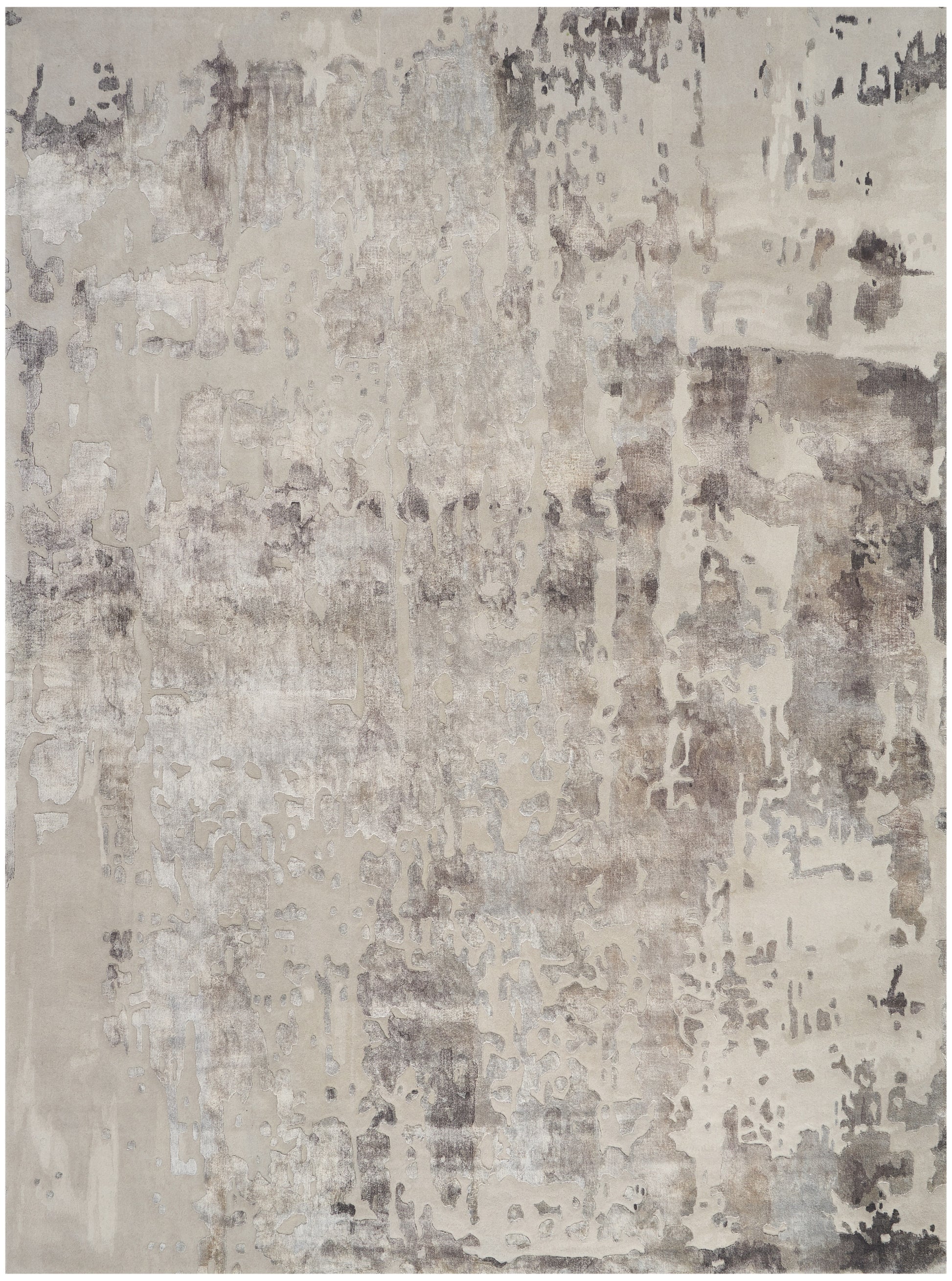 Abstract neutral area rug in beige, taupe and gray with distressed pattern; modern floor decor.