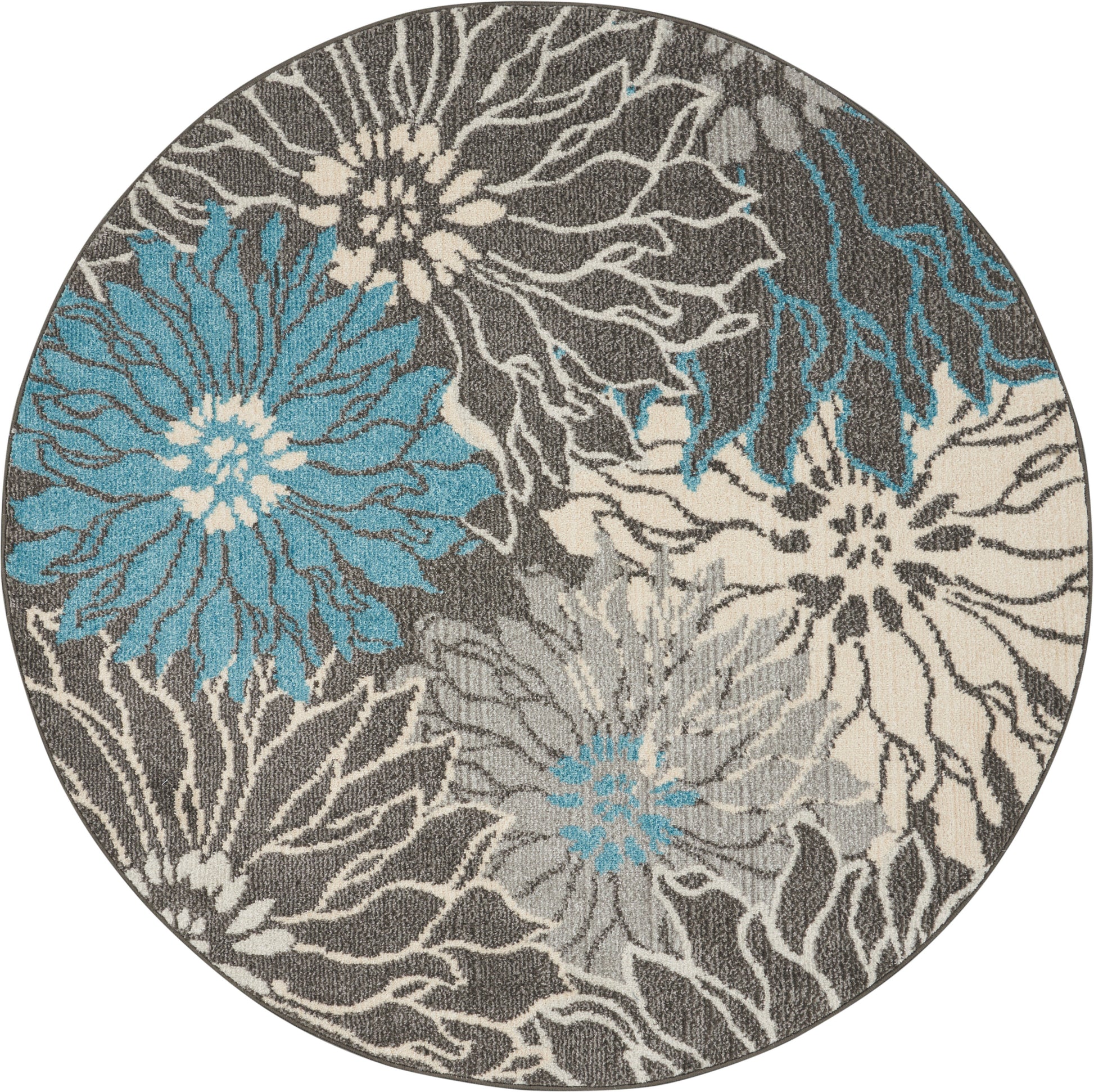 Round rug with grey ground and bold turquoise and cream floral pattern, modern botanical design.