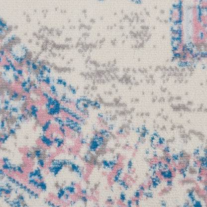 Close-up of cream woven rug with pink, blue and gray abstract floral pattern (round, 4' diameter).
