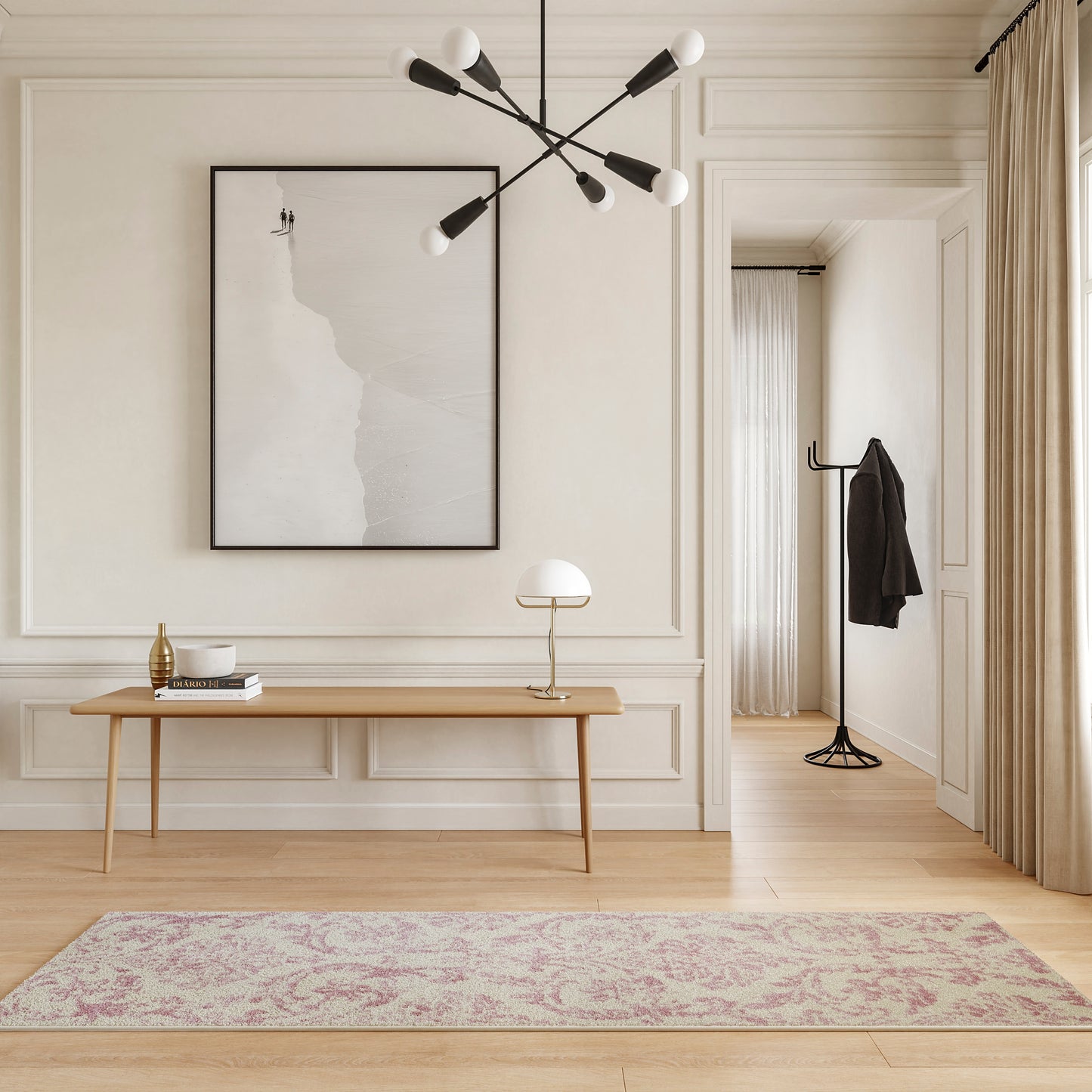 Neutral minimalist entryway with beige paneled walls, wooden console, abstract art, modern chandelier, pink runner rug.