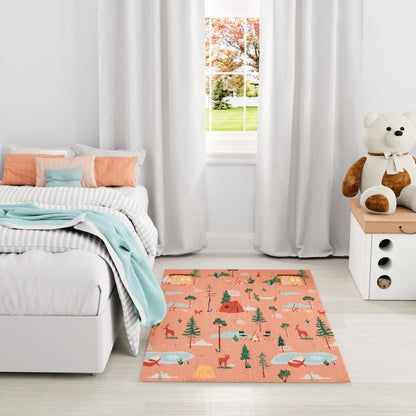 Cozy kids' room with a peach woodland rug, white bed with pastel pillows, aqua throw, curtains, and a teddy on a dresser.