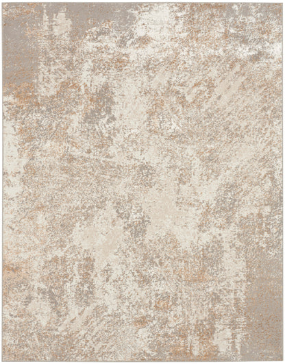 Abstract distressed beige area rug with ivory and taupe tones, soft plush pile.