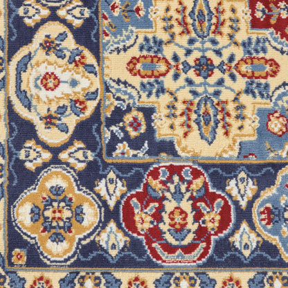 Close-up of an ornate oriental rug with a navy field and ivory, red, and light-blue floral medallions.