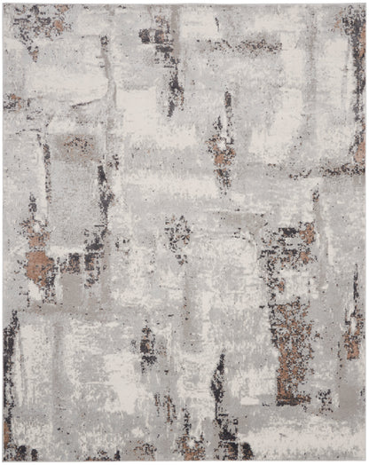 Rectangular abstract distressed rug in light gray, beige and brown tones with charcoal accents.
