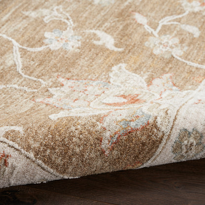 Beige plush runner rug with pale pink, blue and white floral vine pattern on a wooden floor.