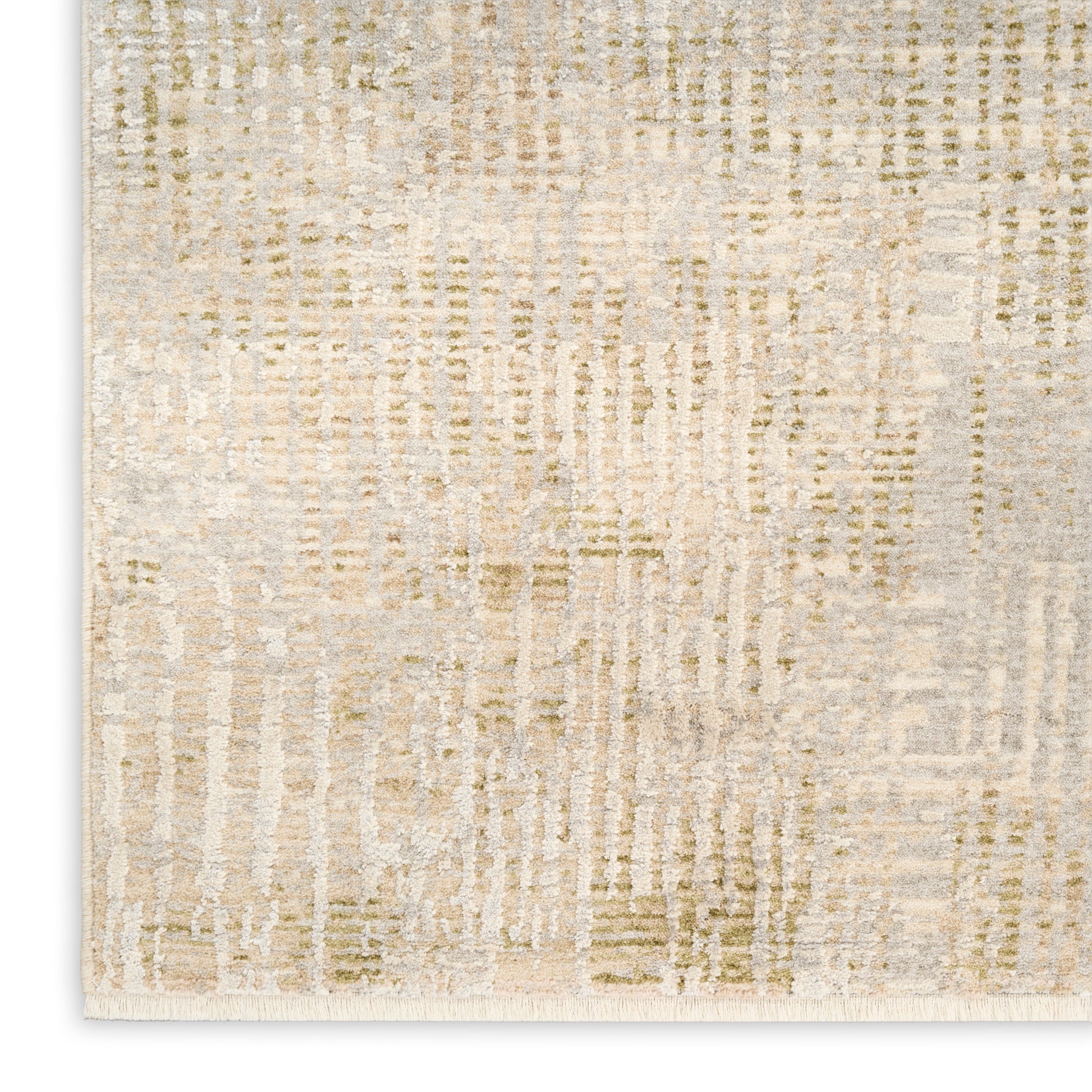 Beige abstract area rug with cream and olive tones and a fringe edge.
