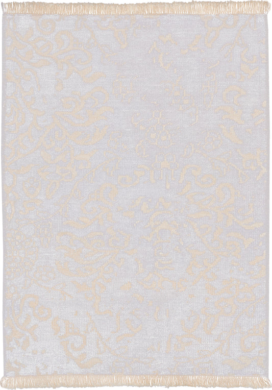 Rectangular rug in light gray with cream damask pattern and fringed edges for living room or bedroom.