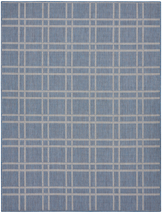 Blue woven rug with beige plaid grid, flat-weave texture; rectangular, modern casual rug for living spaces.