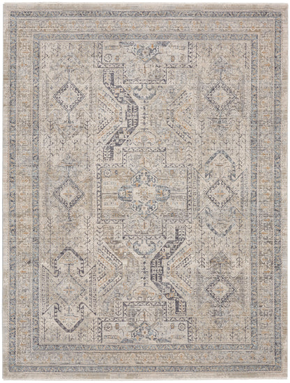 Muted beige-blue distressed oriental area rug with central medallion and geometric border, vintage Persian-inspired.