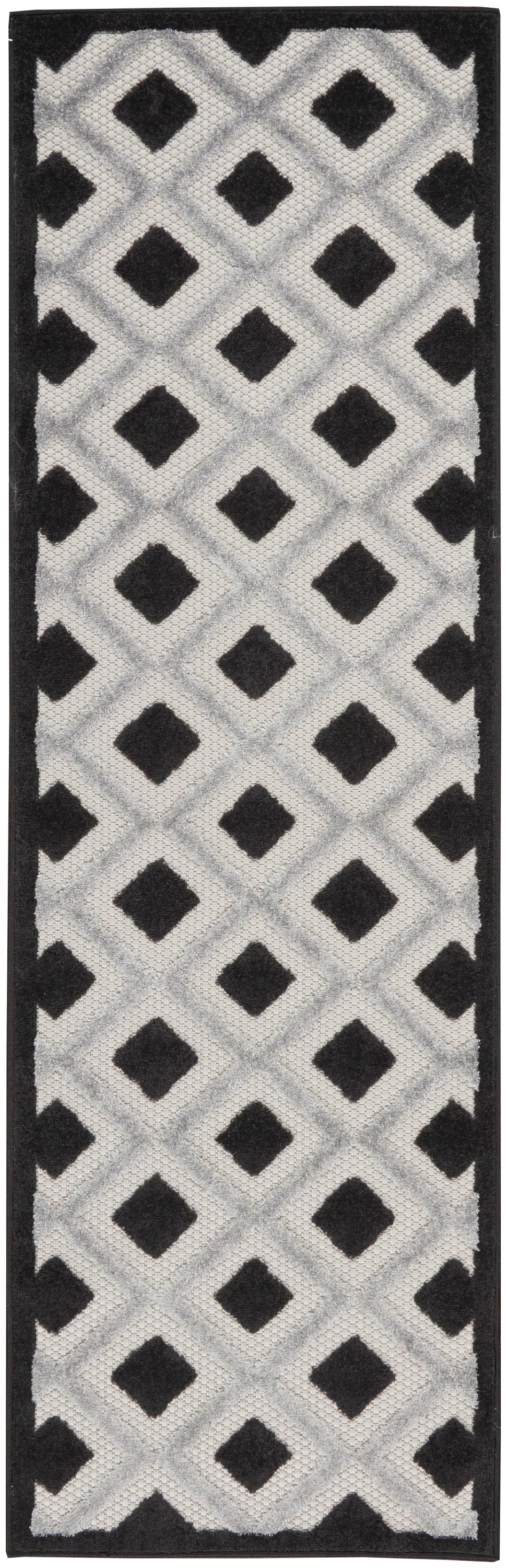 Rectangular rug with black border and gray diamond lattice pattern featuring black diamond shapes.