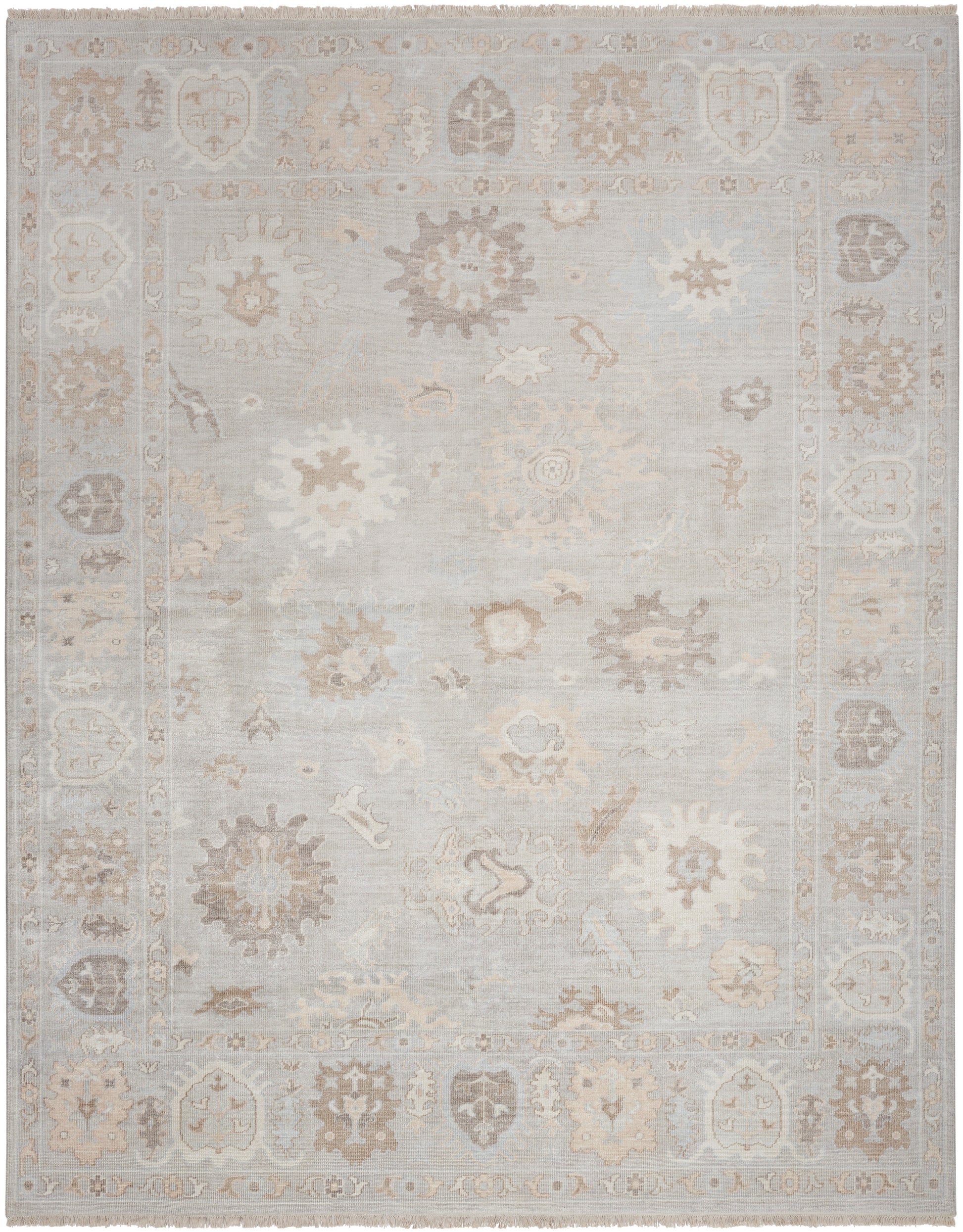 Distressed pale blue oriental area rug with beige floral medallions and ornate border; soft, low-contrast vintage look.