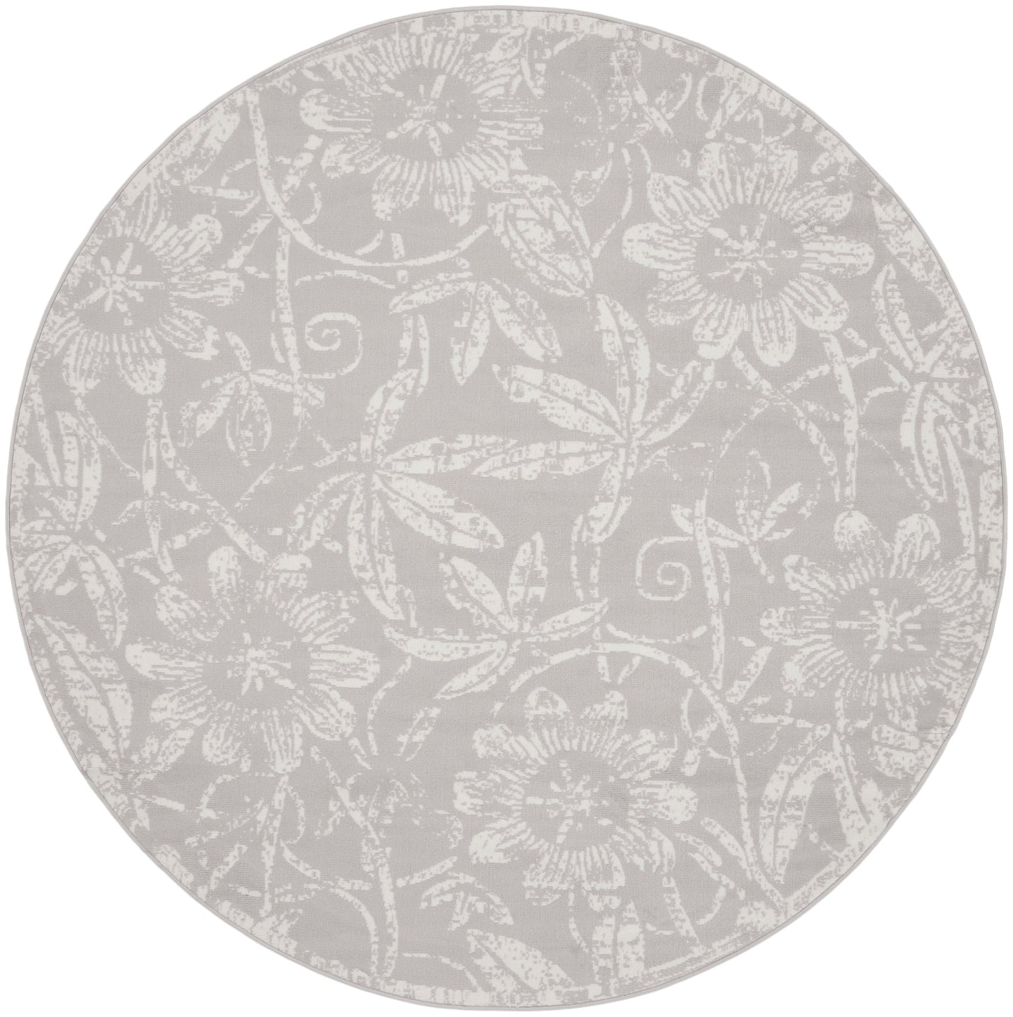 Round grey rug with a subtle white floral damask pattern.
