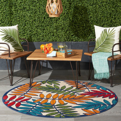 Round tropical rug, 4' diameter.