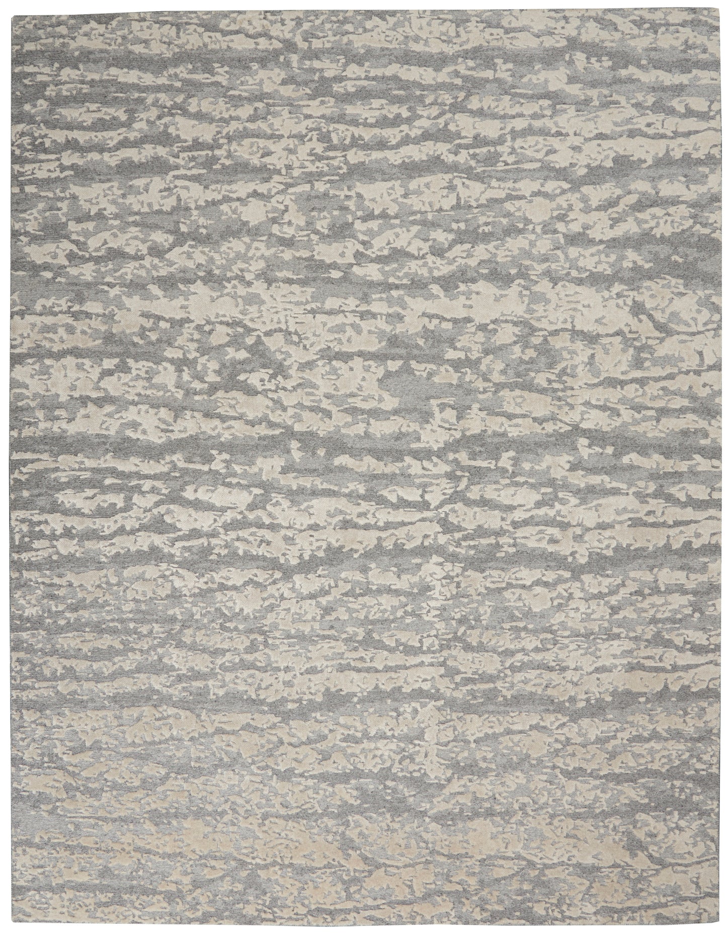 Rectangular gray and cream abstract-pattern area rug with a textured, marled look for modern living spaces.