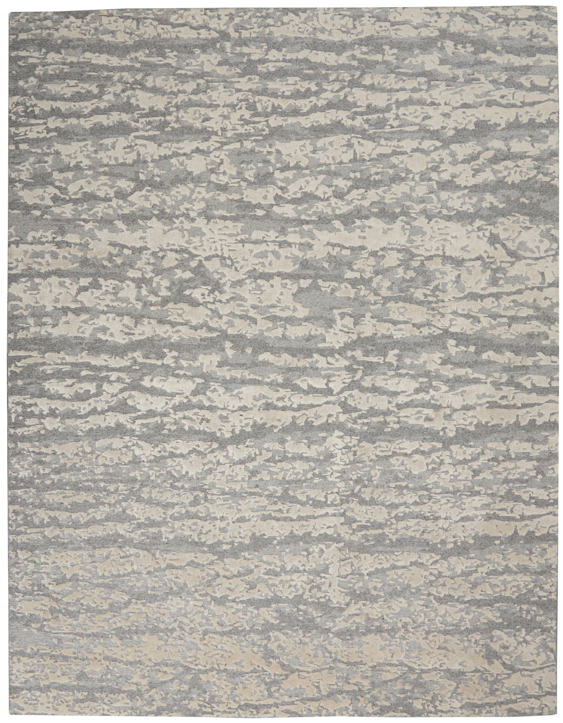 Rectangular gray and cream abstract-pattern area rug with a textured, marled look for modern living spaces.