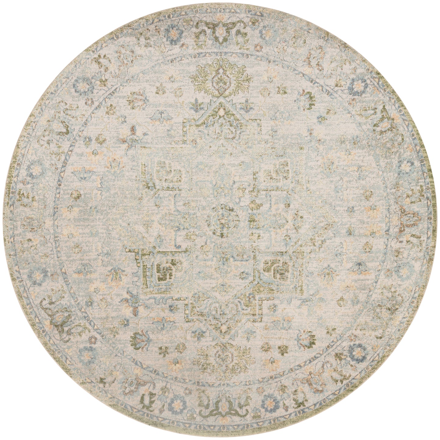 Round distressed area rug in muted beige, blue and gray with an antique floral medallion pattern; vintage, versatile decor.