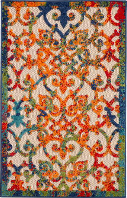 Vibrant oriental rug with multicolored scrolling florals in orange, blue & green on a beige field, teal border.