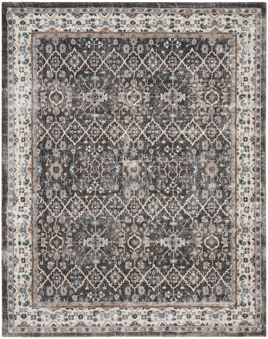 Rectangular Persian-style area rug with dark brown field, ivory lattice floral pattern and light blue accents, beige border, 8' x 10'.
