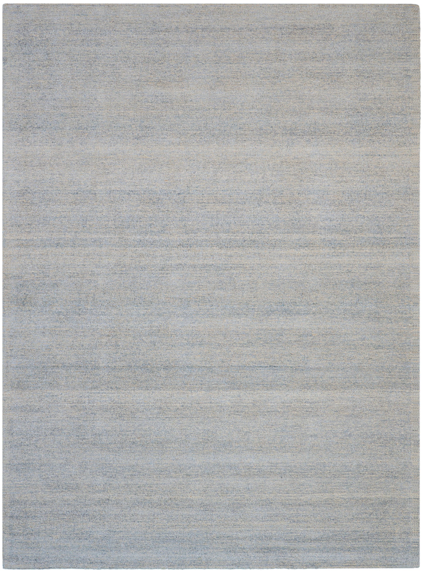Soft blue-gray area rug with subtle tonal variation; modern rectangular rug for living spaces.