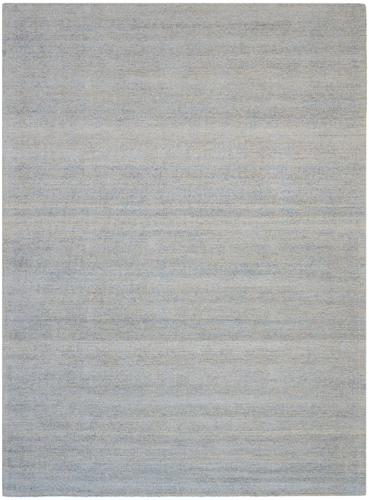 Soft blue-gray area rug with subtle tonal variation; modern rectangular rug for living spaces.