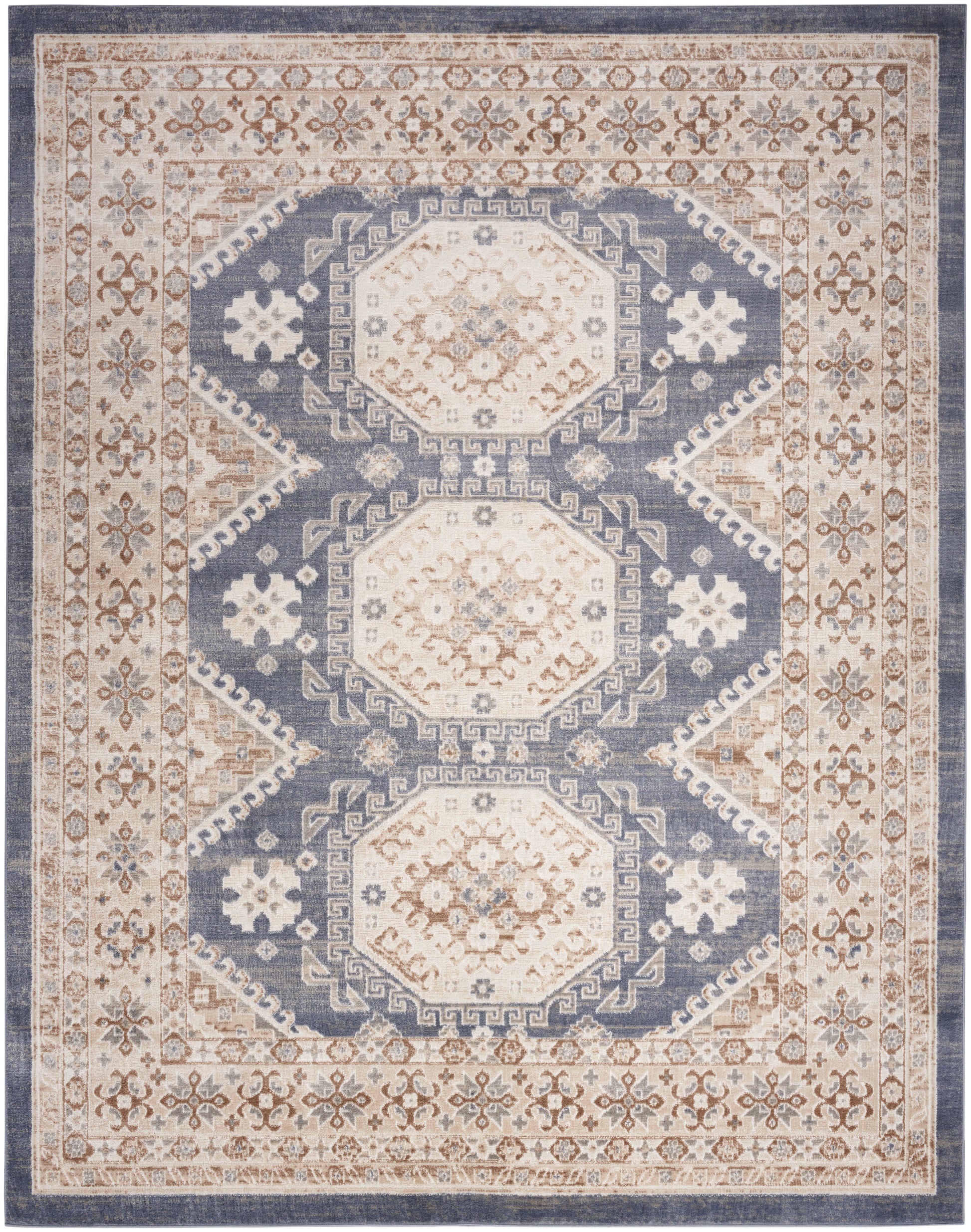 Blue and ivory oriental rug with three cream octagonal medallions and ornate beige floral borders.