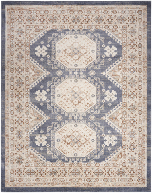 Blue and ivory oriental rug with three cream octagonal medallions and ornate beige floral borders.