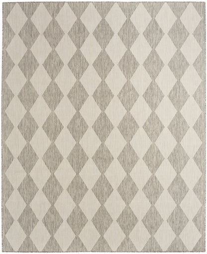 Rectangular area rug featuring alternating light beige & gray diamonds in a textured woven pattern.
