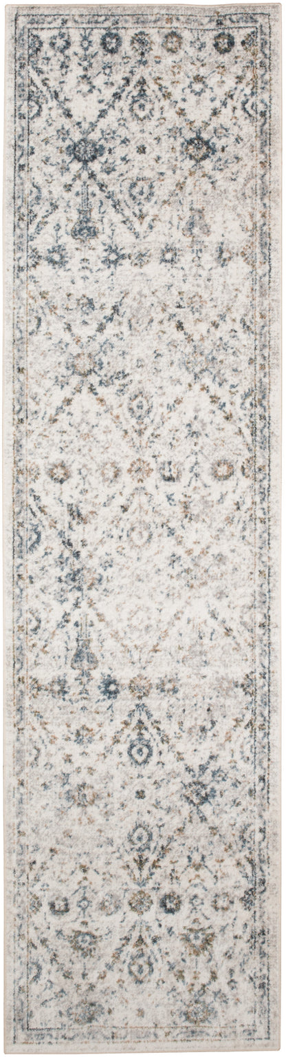 Long runner rug with ivory distressed background and faded blue-gray oriental medallion motif; bordered edges.